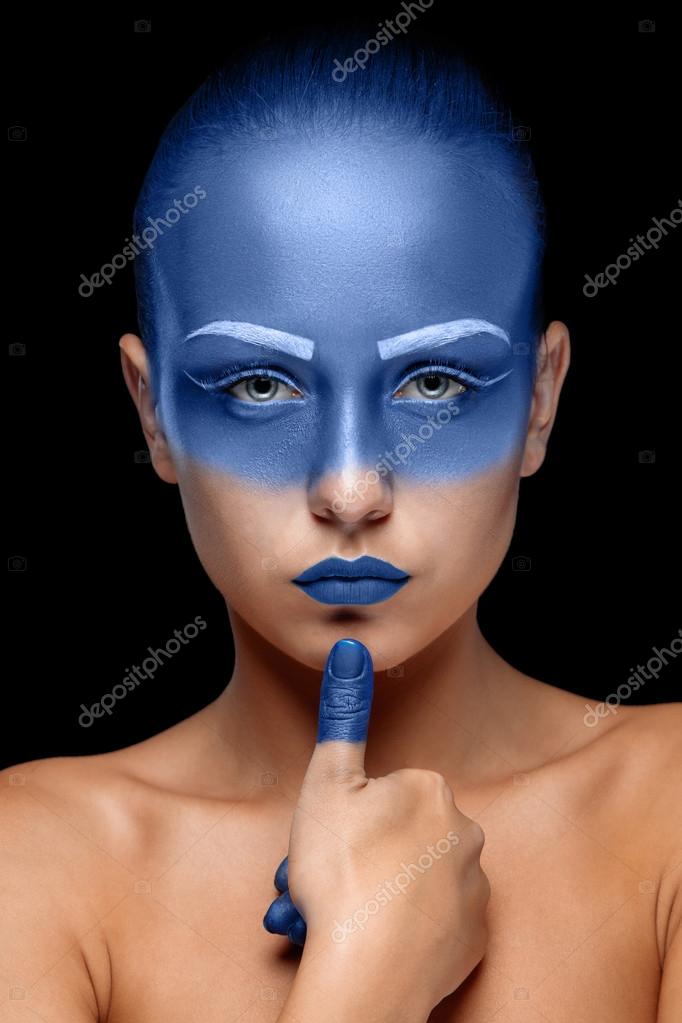 Portrait of a woman who is posing covered with blue paint Stock Photo by  ©vova130555@gmail.com 79436824