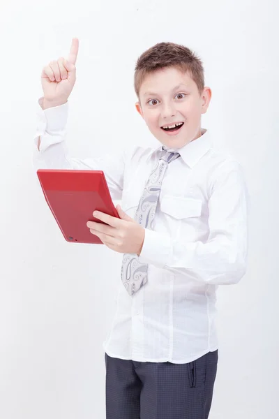 Portret van tiener jongen met Rekenmachine op witte achtergrond — Stockfoto