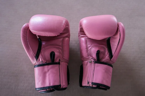 Pair of pink boxing gloves