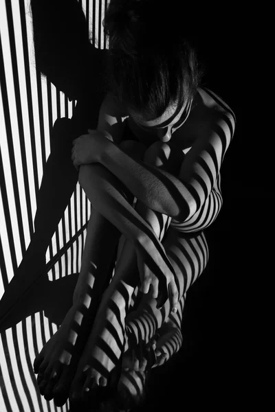 The nude woman with black and white zebra stripes — Stock Photo, Image