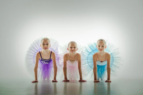Three little ballerinas in dance studio — Stock Photo, Image