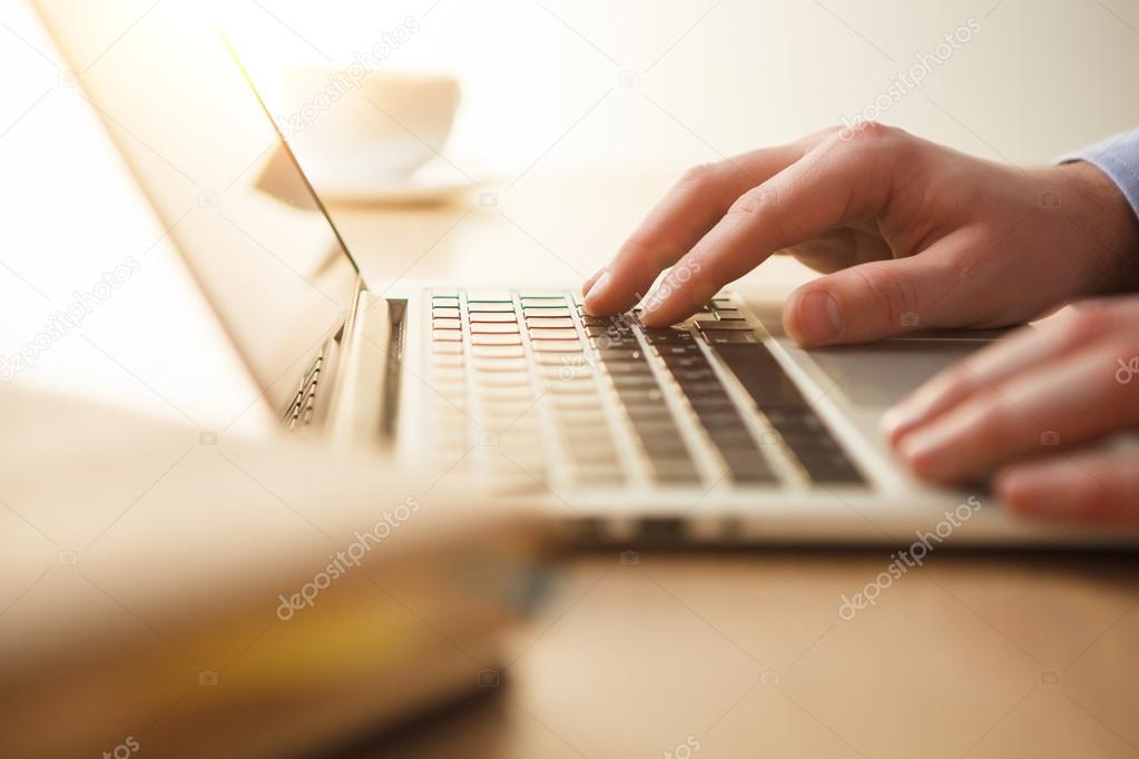 The hands on the keyboard