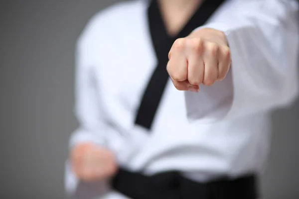 The karate girl with black belt — Stock Photo, Image