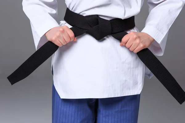 The karate girl with black belt — Stock Photo, Image