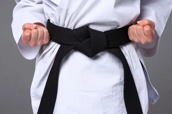 The karate girl with black belt — Stock Photo, Image