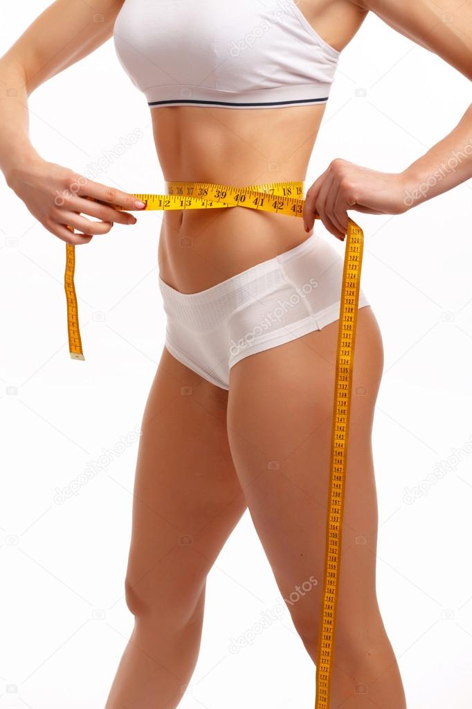 Premium Photo  Perfect slim body woman excited amazed with thin waist  loose waist measuring tape