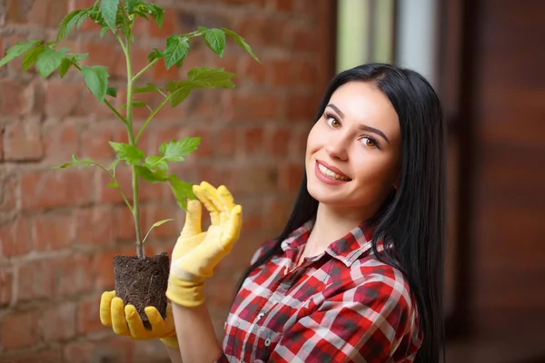 Portrait of a charming young female gardening — Stock Photo, Image