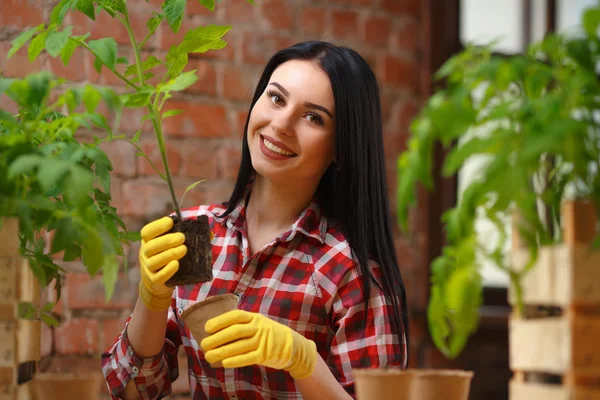 Portrait of a charming young female gardening — Stock Photo, Image