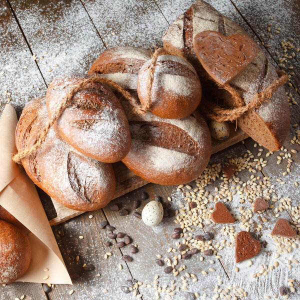 Variety of rye bread on a wooden background