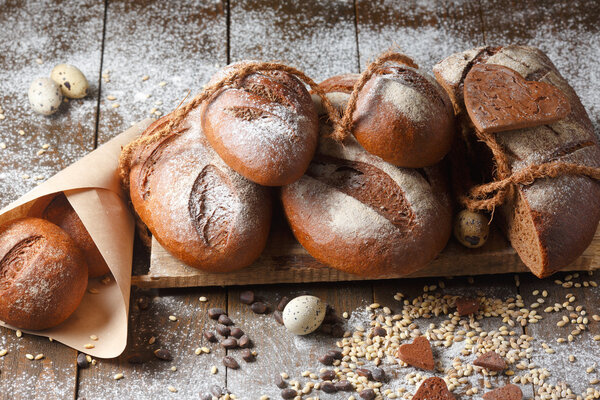 Variety of rye bread on a wooden background