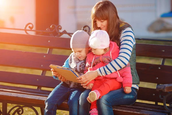 Happy family of three — Stock Photo, Image