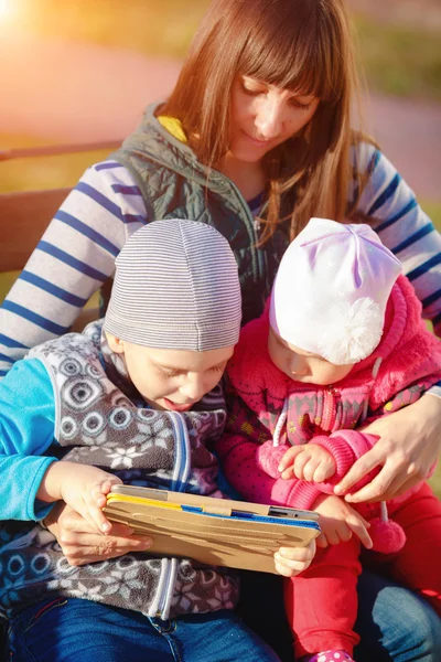 Happy family of three — Stock Photo, Image