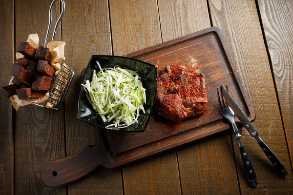 Delicious steak with red chili pepper — Stock Photo, Image