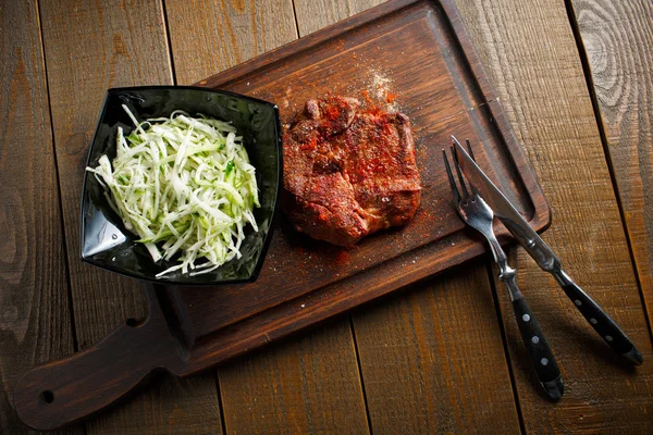 Delicious steak with red chili pepper — Stock Photo, Image