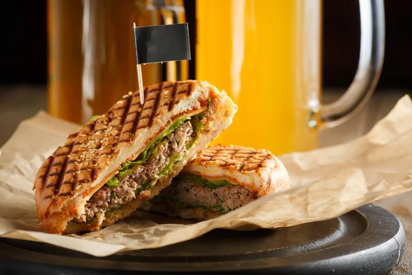 One burger with sliced cutlet, lettuce and cheese — Stock Photo, Image