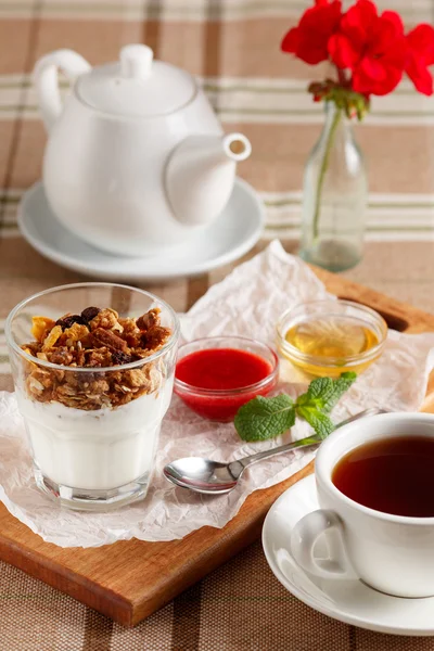 Yogurt with muesli and nuts — Stock Photo, Image