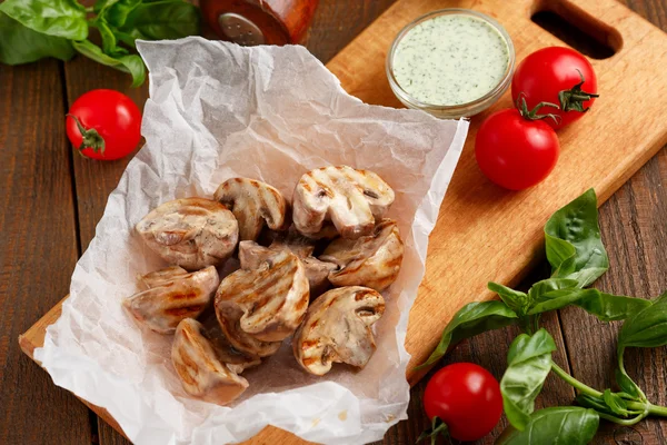 Grilled champignons with sauce — Stock Photo, Image