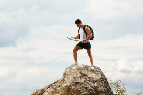 Hiker with a backpack — Stock Photo, Image
