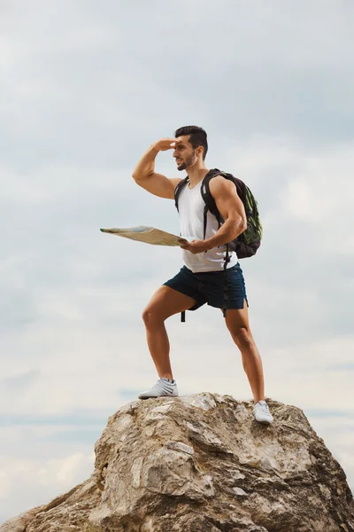 Hiker with a backpack — Stock Photo, Image
