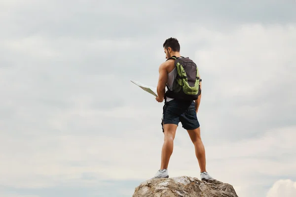 Hiker with a backpack — Stock Photo, Image