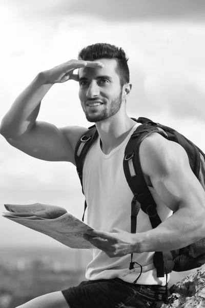 Black and white photo of a tourist with backpack — Stock Photo, Image