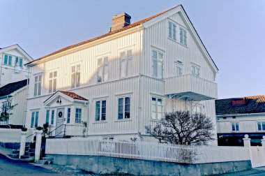 Typical norwegian wooden old house clipart