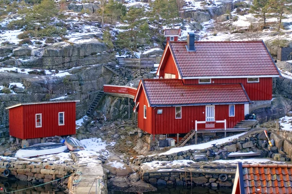 Red fishing cottages on the bay — Stock Photo, Image