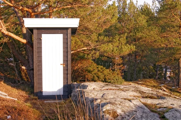 Black wooden building toilets — Stock Photo, Image