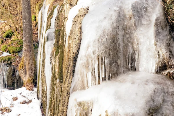 Icicles and ice on the rocks — Stock Photo, Image