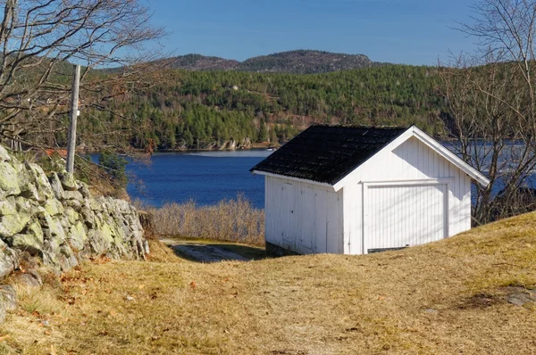 Norwegian garage over the river — Stock Photo, Image