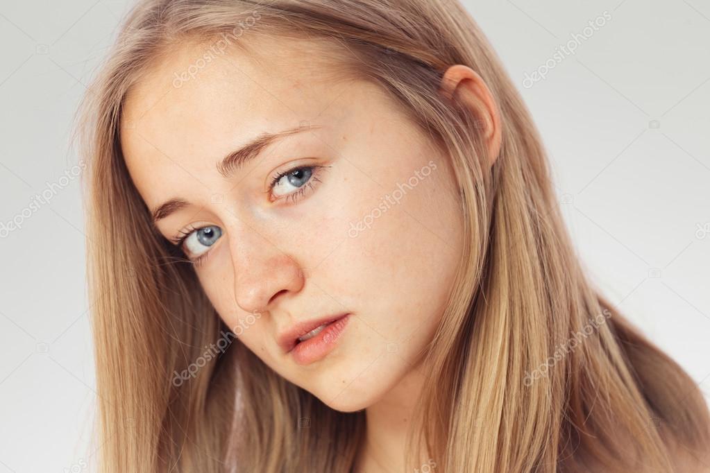 Beauty Portrait Of A White Girl With Clean Skin Blue Eyes And