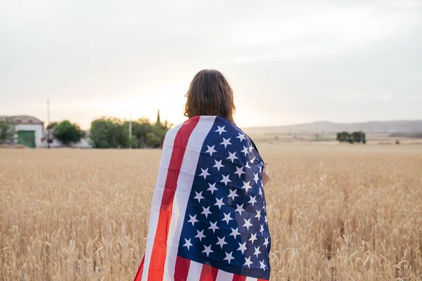 Menina com bandeira americana — Fotografia de Stock