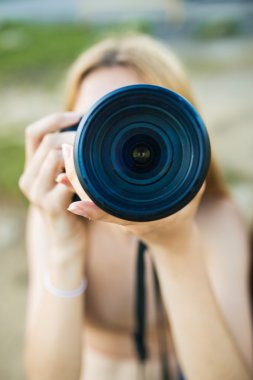 Blonde woman taking pictures clipart