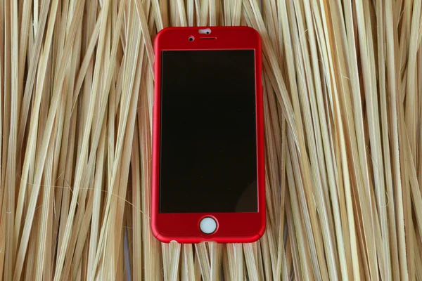 Smartphone in the wood background — Stock Photo, Image