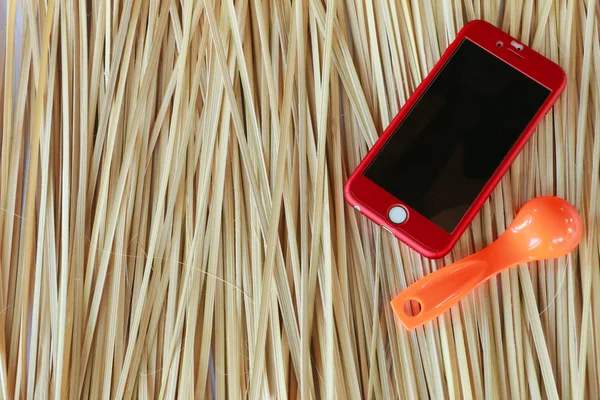 Smartphone in the wood background — Stock Photo, Image