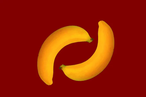 Dwa Owoce Banana Jako Symbol Yin Yang Odizolowany Czerwono Koncepcja — Zdjęcie stockowe
