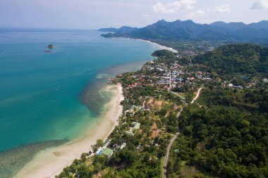 Aerial view of tropical coastline on Koh Chang, Thailand with mountains,jungle and ocean clipart
