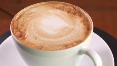 4k footage of a coffee spinning around