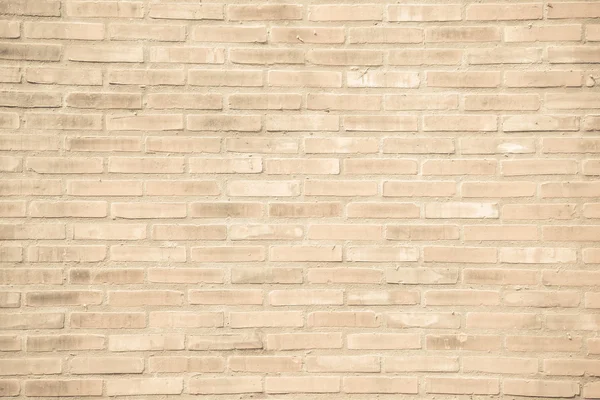 Beige grunge brick wall texture background