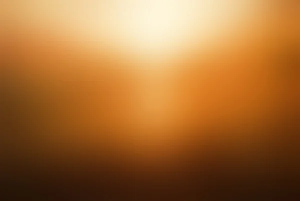 Latar belakang kabur oranye-coklat abstrak — Stok Foto