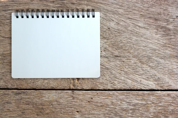 Page of notebook on wood texture — Stock Photo, Image