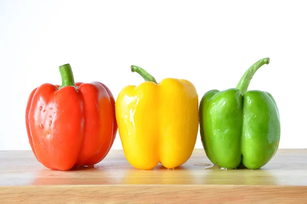 Sweet peppers in red, yellow and green color — Stock Photo, Image