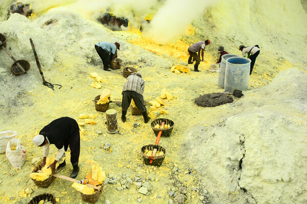 Sulfur miners in Kawah Ijen, Java, Indonesia