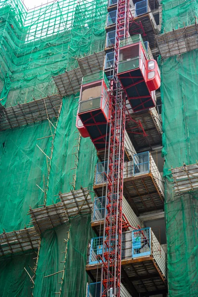 Construction with elevator lifts — Stock Photo, Image