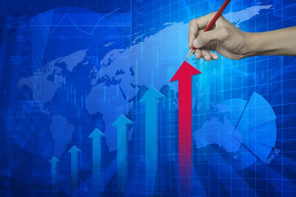 Hand pointing pencil to red arrow head with financial chart and — Stock Photo, Image