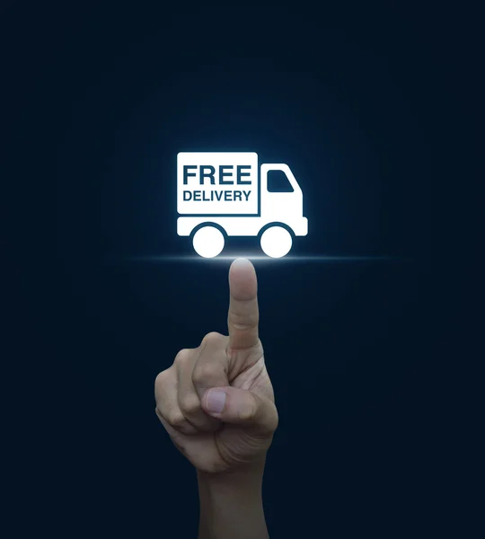 Hand pressing free delivery truck icon on blue background, Trans — Stock Photo, Image