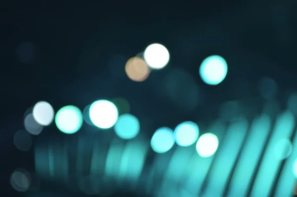Розфокусоване світло і тінь лампочки, зелений тон — стокове фото