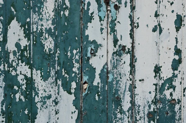 Descascamento de tinta cor branca e verde na parede de madeira velha — Fotografia de Stock