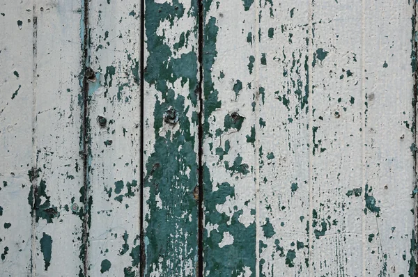 Łuszczenie farby kolor biały i zielony na stare drewniane ściany — Zdjęcie stockowe
