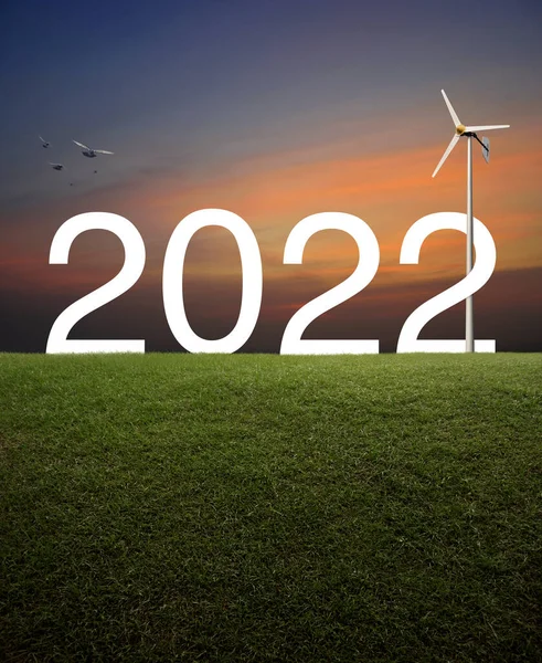 2022 White Text Wind Turbine Green Grass Field Sunset Sky — Stock Photo, Image